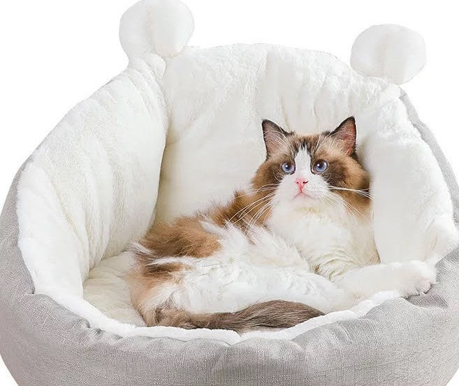 Teal Zeus cozy plush cat bed sleeping bag with raised bolsters and faux fur lining for napping cats
