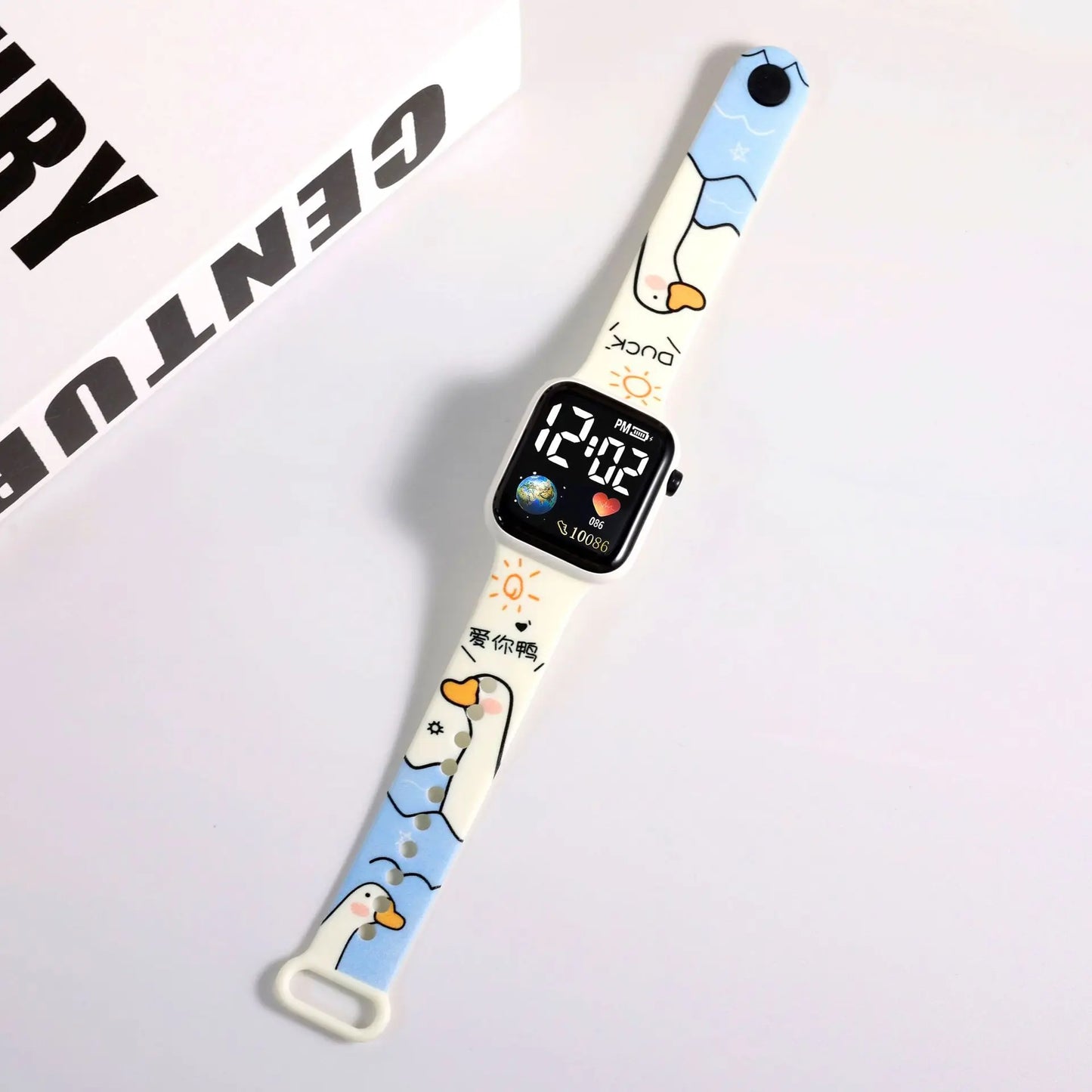 MINISO silicone smart watch accessory with blue and white duck print and black digital face Hello Kitty digital watch for girls