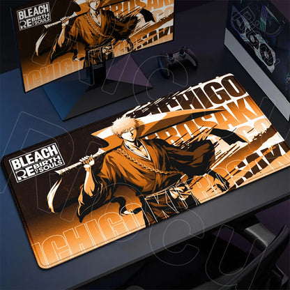 Bleach-themed mouse pad on a desk with a monitor displaying the same design.