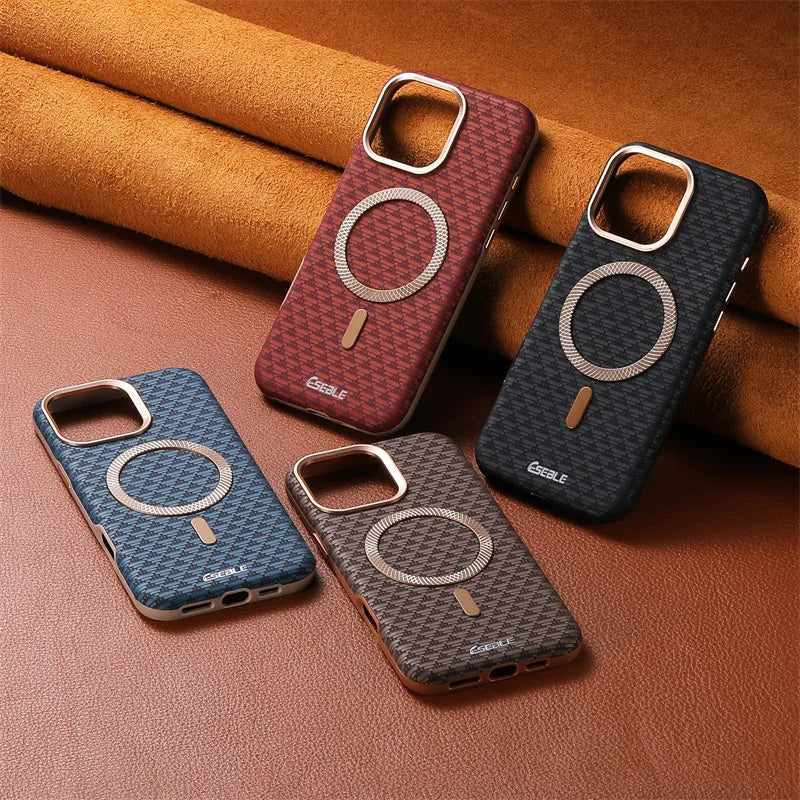 Four phone cases in different colors on a textured surface