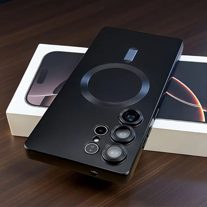 Black smartphone with multiple camera lenses on a wooden surface