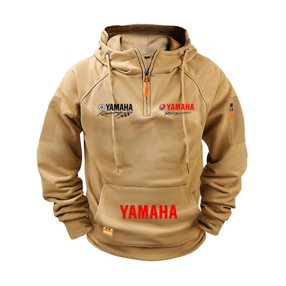 Beige hoodie with Yamaha logos on a white background