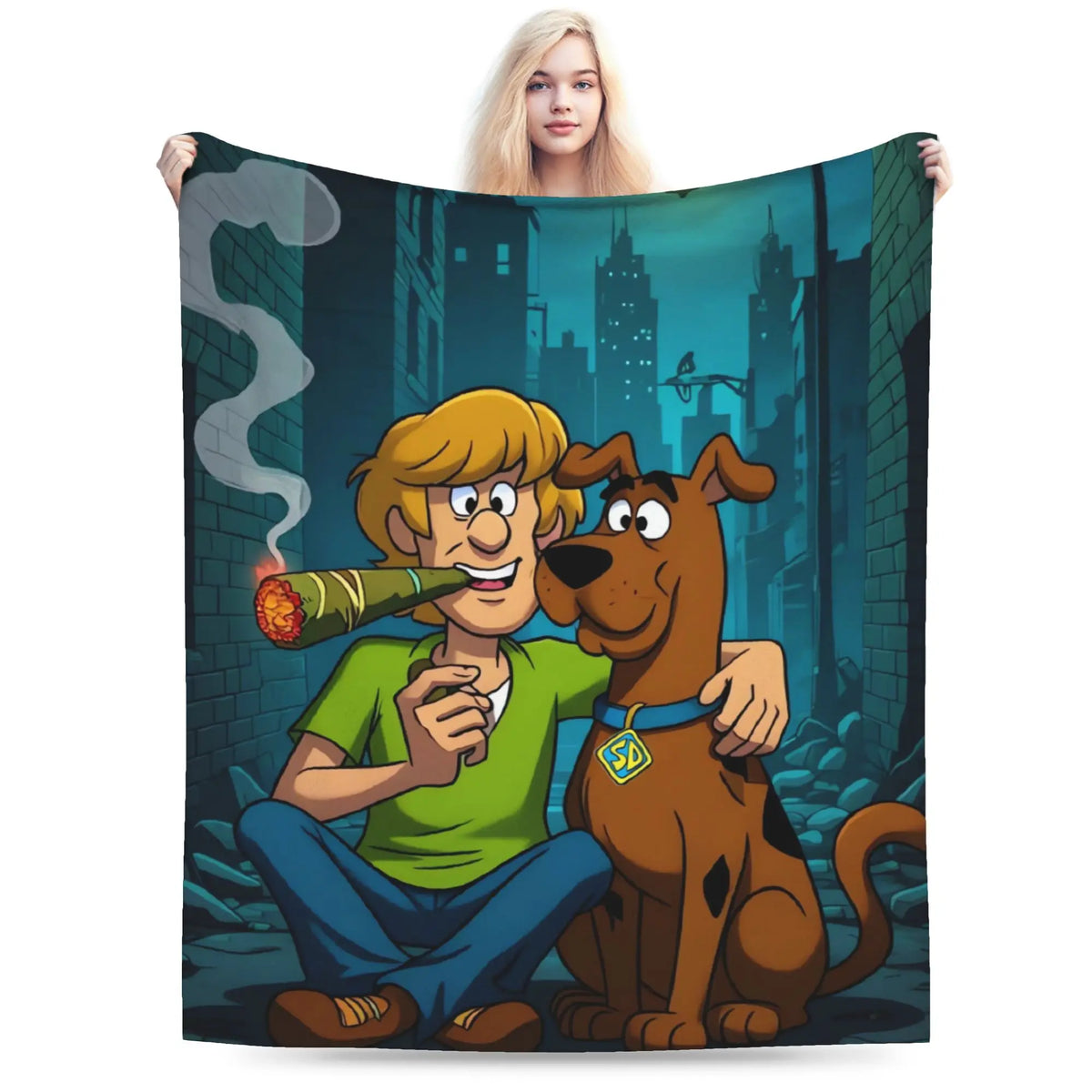 A woman holds up a large printed blanket or tapestry featuring cartoon characters from Scooby-Doo in a dark alley at night. The blanket shows Shag and Scooby sitting together, with Shag smoking a joint and Scooby wearing a blue collar.