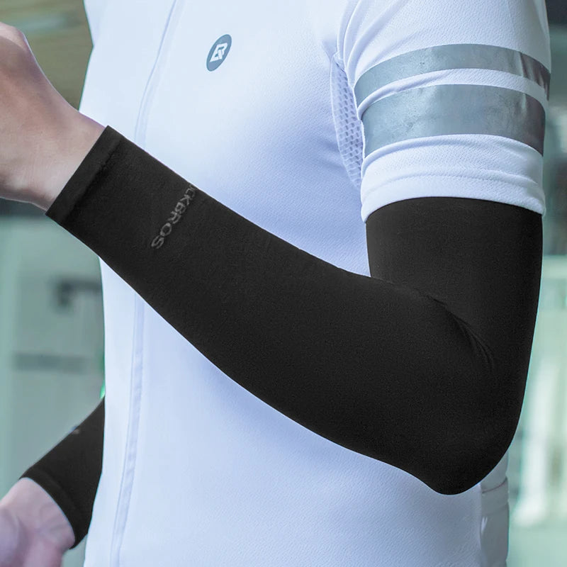 Person wearing black arm sleeves with a blurred background