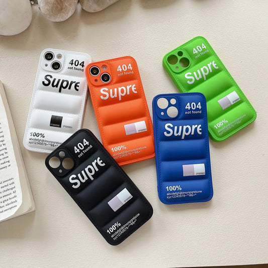 Five phone cases with 'Supreme' branding on a light surface.
