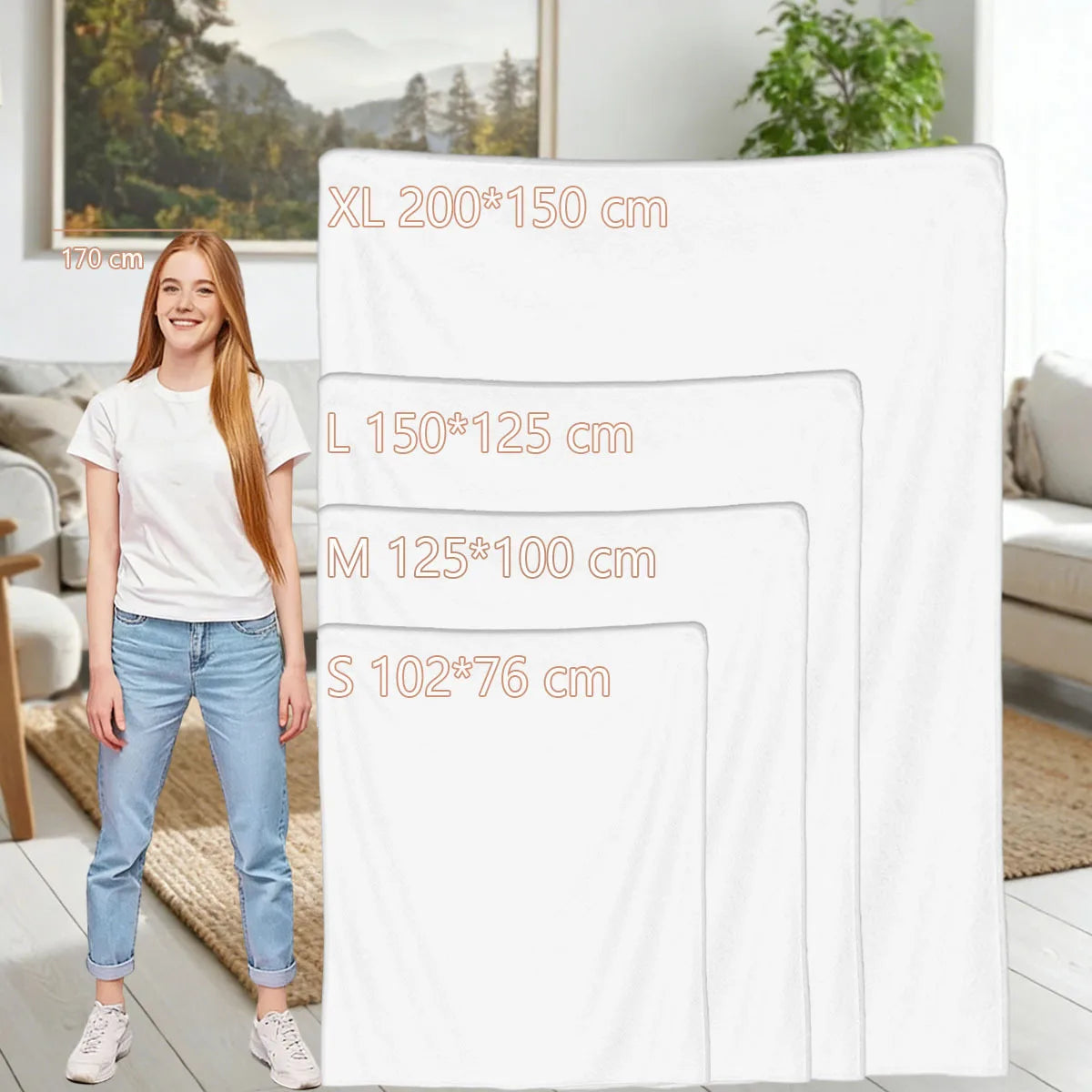 A woman stands beside a large white bedding set displayed in four sizes with printed size labels: XL 200*150 cm, L 150*125 cm, M 125*100 cm, and S 102*76 cm. The setting appears to be a bright living room with a sofa, rug, and framed wall art in the background.
