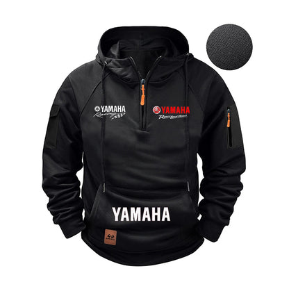 Black Yamaha hoodie with brand logos on a white background