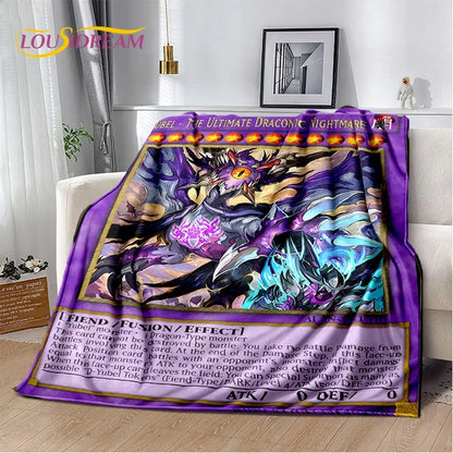 A colorful fantasy dragon-themed blanket draped over a white sofa in a living room setting. The blanket features a purple border, detailed dragon artwork in black, purple, blue, and gold, and a card-style text section at the bottom resembling a trading card.