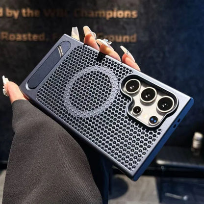 Person holding a phone case with a unique design, featuring a textured surface and camera module.