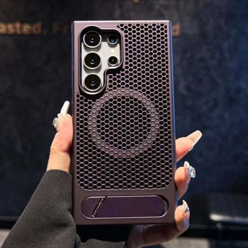 Hand holding a phone case with honeycomb design and brand logo.