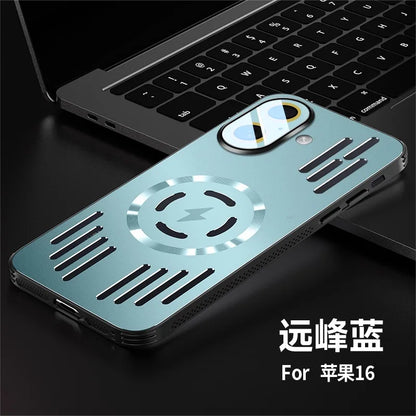 A metallic light blue protective phone case for an iPhone 16, displayed diagonally on a dark surface next to a laptop keyboard. The case features a circular magnetic wireless charging center and horizontal vent-like cutouts on the sides.