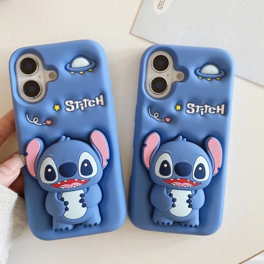 Two blue phone cases featuring a 3D Stitch character design, shown on a light beige surface with one case being held by a hand.