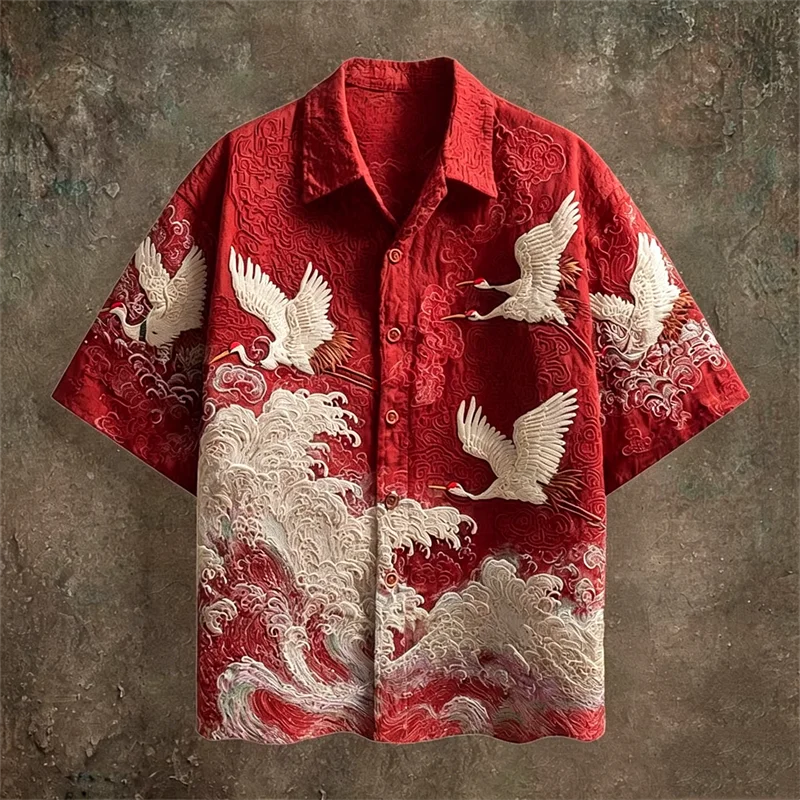 Red shirt with white crane and wave patterns on a textured brown background