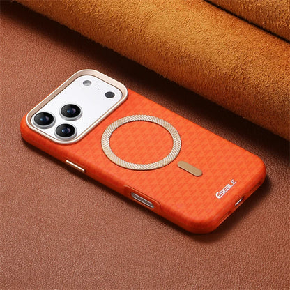 Orange phone case with magnetic ring on a brown textured surface