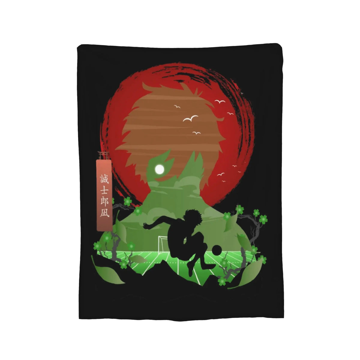 A black rectangular textile item, likely a towel or blanket, featuring a stylized graphic print of a soccer player in front of a red sun and green hills, with a small vertical brown tag containing white characters.