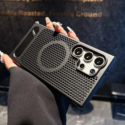 Person holding a phone case with honeycomb design and camera module