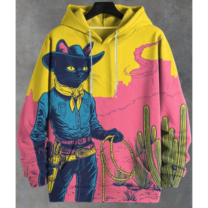 A yellow and pink pullover hoodie featuring a graphic print of a cowboy cat wearing a blue outfit, standing in a desert landscape with cacti.