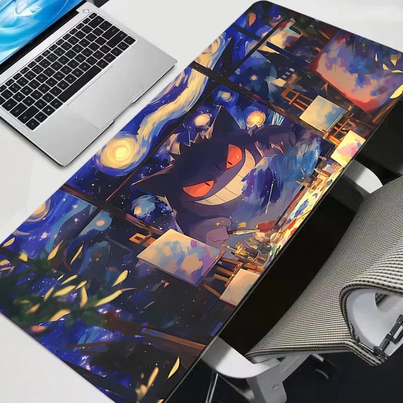Gengar-themed desk mat with a laptop and mouse on a desk