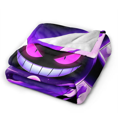A folded throw blanket featuring a printed anime-style character face in purple, black, and pink, with a white sherpa lining visible on the reverse side, shown on a plain white background.