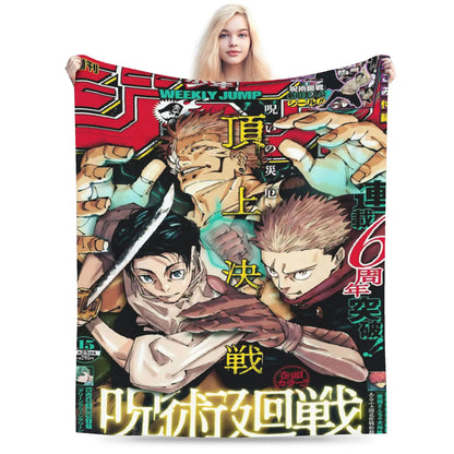 A person holds up a large printed blanket or tapestry featuring a colorful manga cover with multiple illustrated characters and Japanese text. The background is plain white.