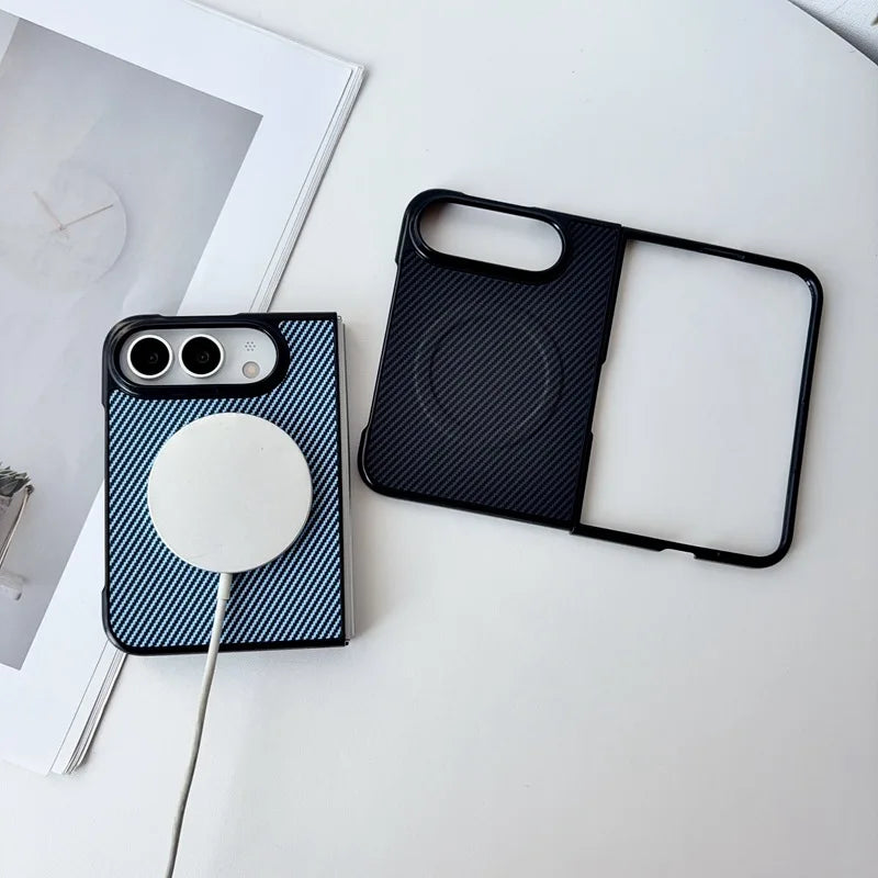 Two smartphone cases on a white surface: one case on a phone with a blue-and-white diagonal stripe pattern and a white MagSafe ring, and one black split-style case placed beside it.