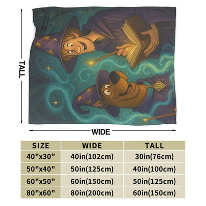 A printed blanket or throw featuring an illustrated wizard and a dog in starry teal and purple space, shown with measurement arrows labeled TALL and WIDE above a size chart table.