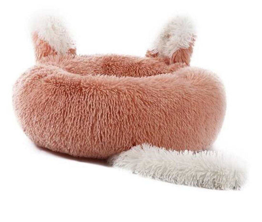 Teal Zeus plush pet bed for cats and small dogs in pink faux fur donut shape with raised rim and ears