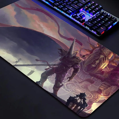 Riccu Blasphemous game mouse pad featuring Penitent One artwork on oversized gaming desk mat beside RGB keyboard