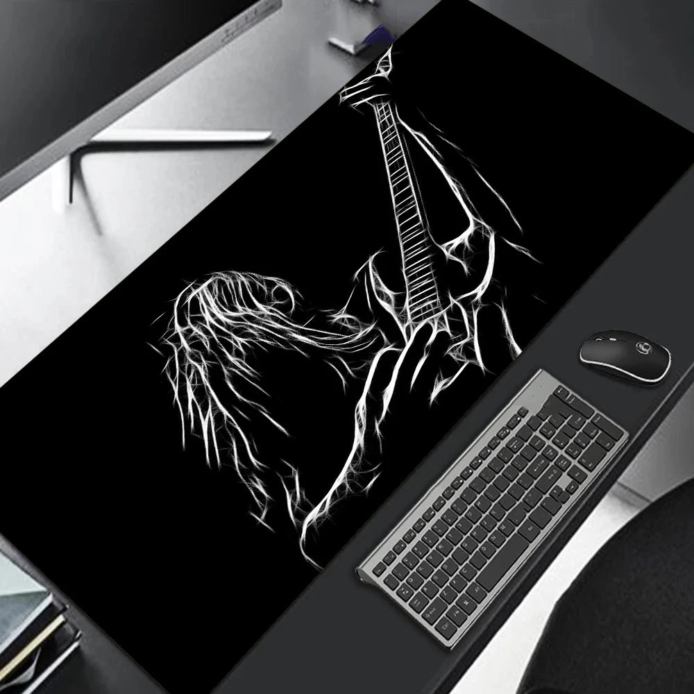 MRGLZY large gaming mouse pad with black surface and white sketched electric guitarist design under keyboard