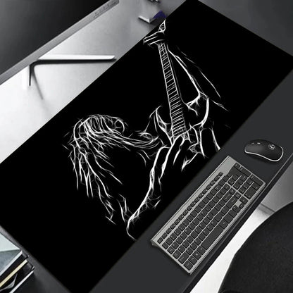 MRGLZY large gaming mouse pad with black surface and white sketched electric guitarist design under keyboard