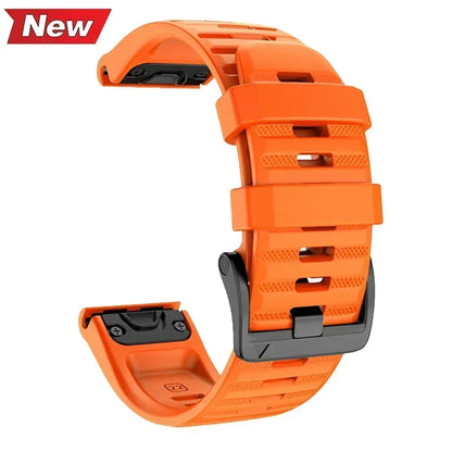 Orange silicone Garmin Instinct 2X replacement band with black metal buckle and quick release connectors