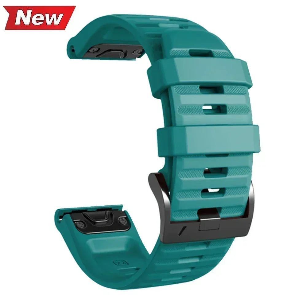 Teal silicone Garmin Instinct 2X replacement band with metal buckle and quick release connectors